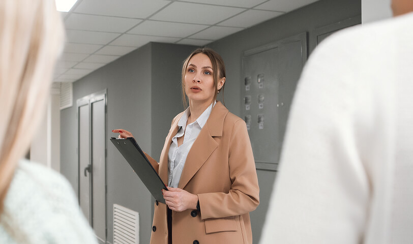 Estate agent performing a property inspection.